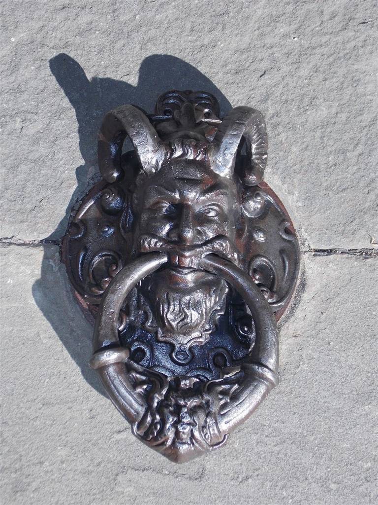 antique cast iron door knocker