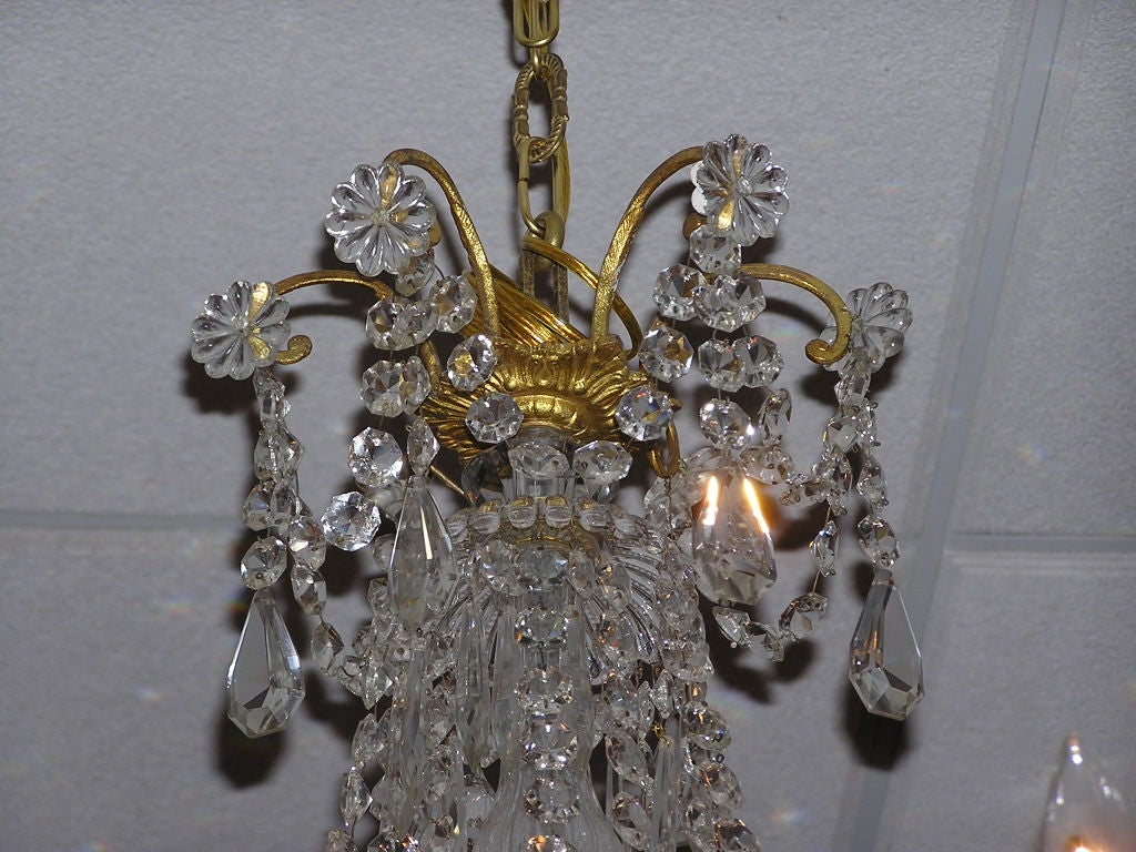 Early 19th Century French Gilt Bronze and Crystal Six Light Chandelier, Circa 1820 For Sale