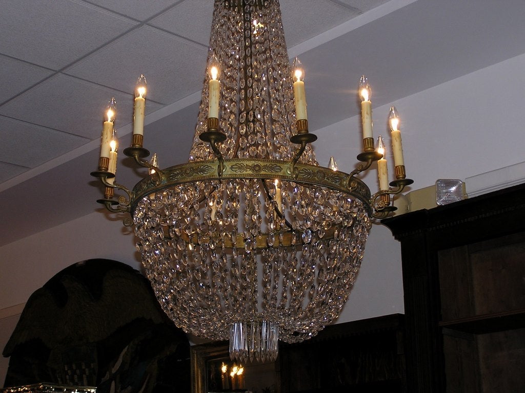 Late 18th Century French Regency Foliage Gilt Bronze and Crystal Twelve Light Chandelier, C. 1790 For Sale