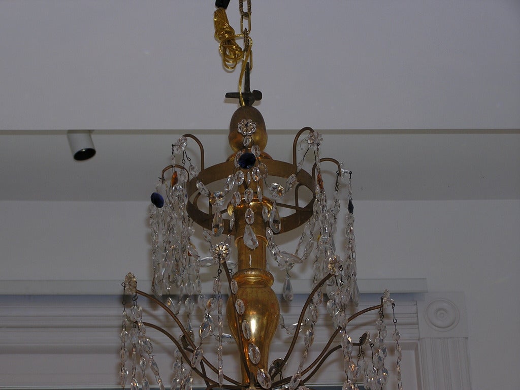 Neoclassical Pair of Italian Gilt Carved Wood & Crystal Eight Bronze Arm Chandeliers, C. 1790 For Sale