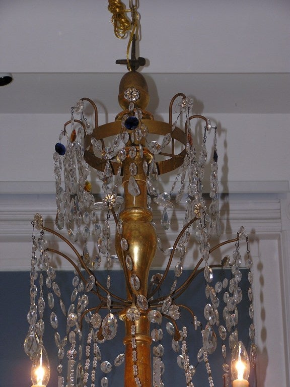 Cast Pair of Italian Gilt Carved Wood & Crystal Eight Bronze Arm Chandeliers, C. 1790 For Sale
