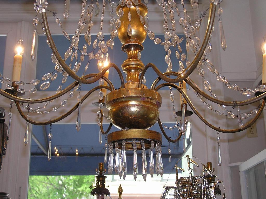 Late 18th Century Pair of Italian Gilt Carved Wood & Crystal Eight Bronze Arm Chandeliers, C. 1790 For Sale