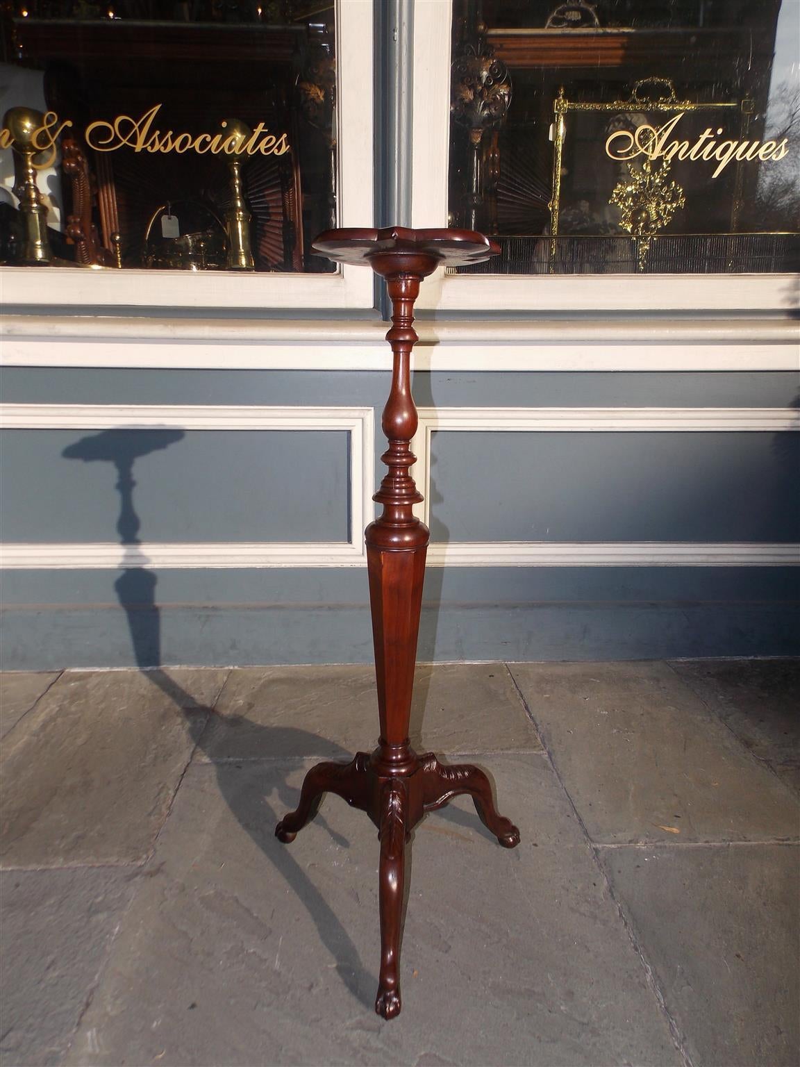 Irish Mahogany Pedestal with carved decorative top, turned bulbous centered pedestal, and terminating on acanthus tripod base with claw and ball feet. Early 19th Century