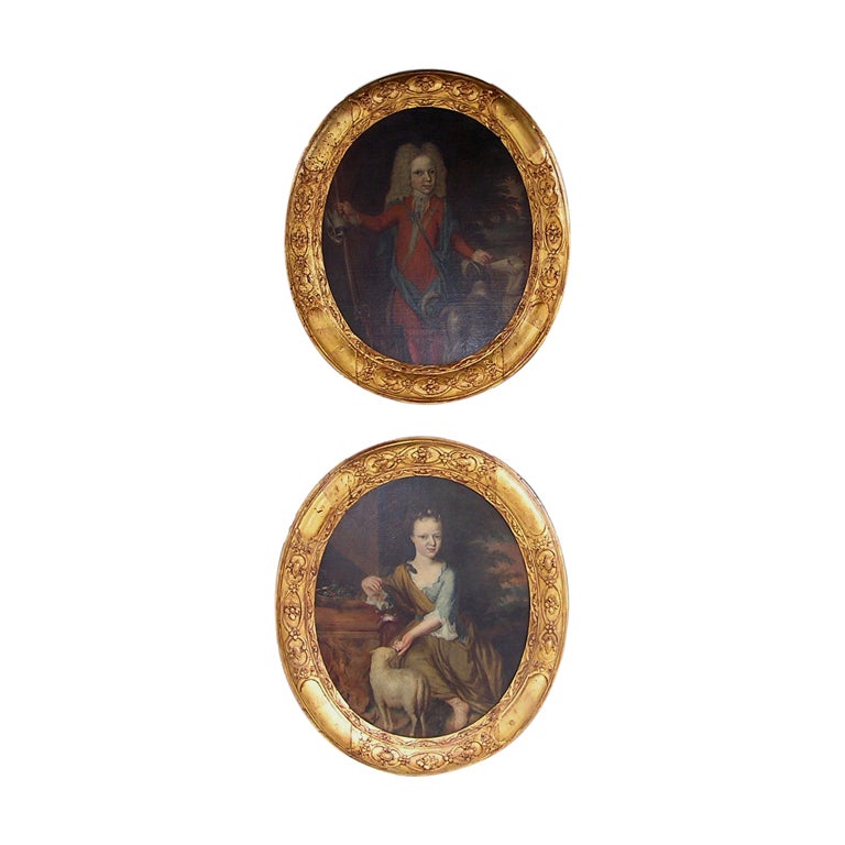 Pair of English Oval Oil on Canvas  Portraits For Sale