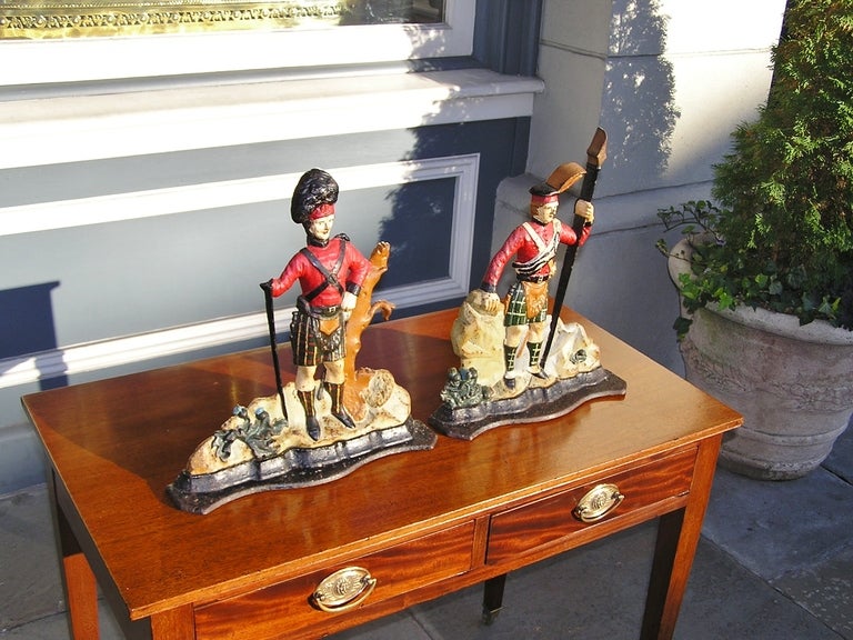 Pair of Cast Iron Scottish hand painted highlander doorstops in full dress attire. Dealers please call for trade price.