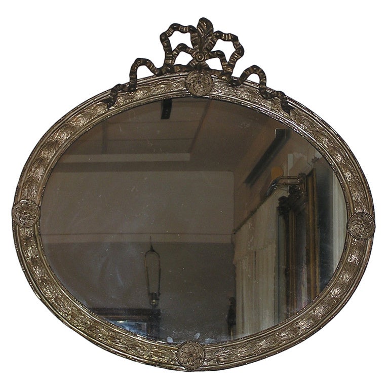 French Silver Gilt Tin Oval Wall Mirror with Central Ribbon Cartouche, C. 1840 For Sale