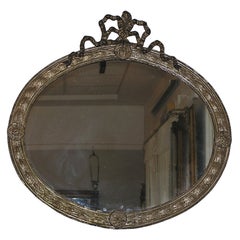French Silver Gilt Tin Oval Wall Mirror with Central Ribbon Cartouche, C. 1840