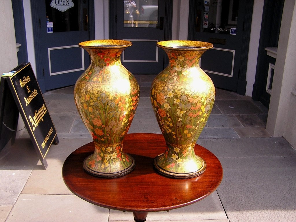 Pair of Kashmiri paper mache vases with hand painted floral and black lacquer motif.