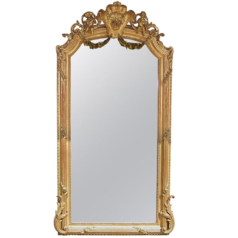 French Gilt Wood & Gesso Foliage Swag Medallion Crest Cherub Wall Mirror, C 1810 For Sale