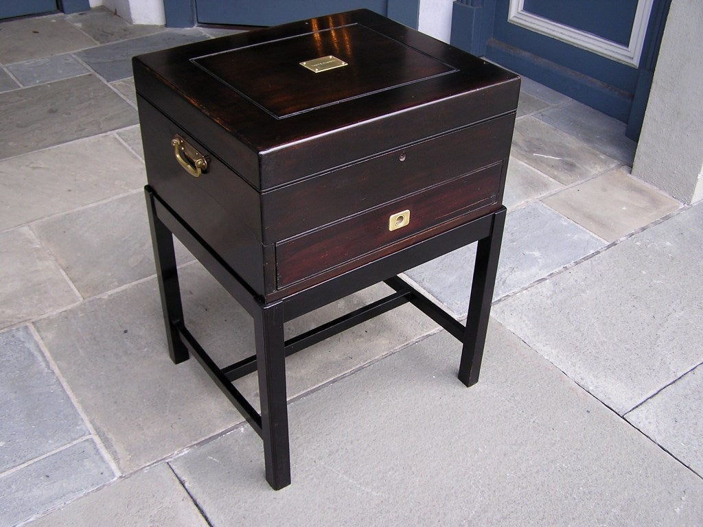 English Black Lacquered Silver Chest on stand with original brass hardware and lined velvet interior.