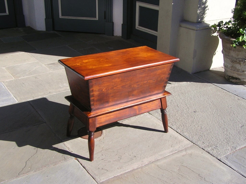 American Cherry dough board with removable top, exposed dove tail's, and ending on stand with Sheraton turned legs.