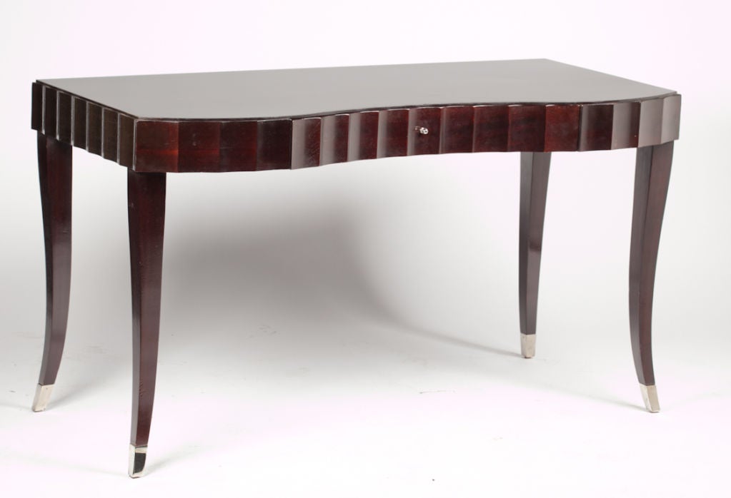 An elegant kidney shaped writing desk in Barbara Barry's signature java 
the perfect writing desk for a fashion forward bedroom or home office
signed inside the desk drawer