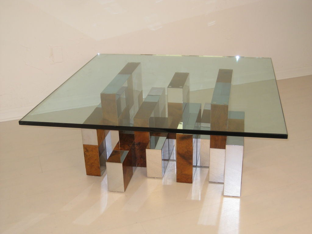Stunning burl-wood and chromed steel Cityscape Cocktail Table by Paul Evans for Directional. Signed An Original Paul Evans. The coffee table is in mint original condition with no damage to the wood, steel, or glass. The original glass is 3/4