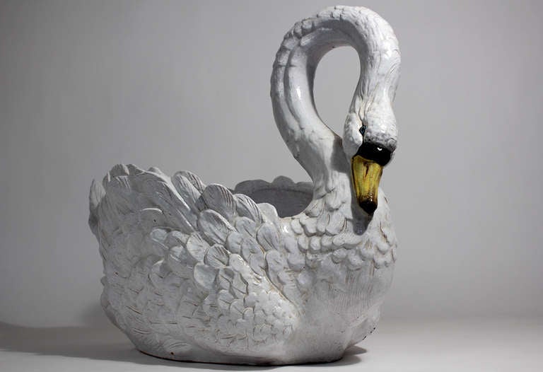 A large Italian decorative terracotta glazed ceramic swan form for outdoor garden or indoor decor with open interior for planting. Dating to the 1950s - 60s. Marked on base 