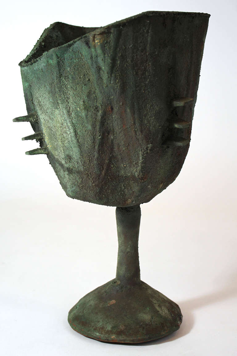 A solid bronze, brutalist style large chalice or goblet form with aged patina. Most likely dating to the 1960s. An inverted bell form as sculptural object.