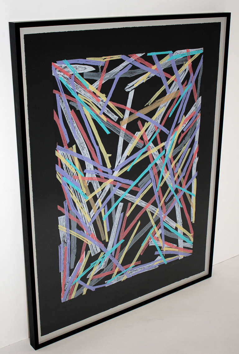 Untitled work by Charles Arnoldi, 1983. Woodcut in colors on black stock with full margins professionally floated in museum quality frame.

This classic and colorful Arnoldi 1980s sticks piece is in excellent condition with no fading or