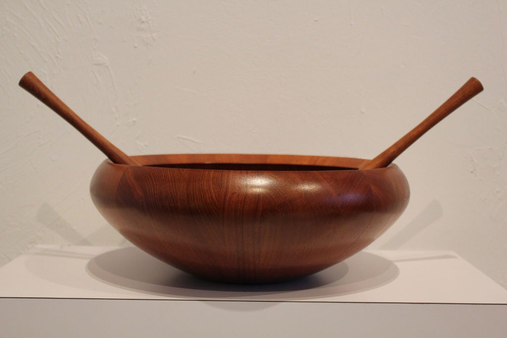 Large solid teak wood salad bowl and serving spoons designed by Jens Quistgaard for Dansk. Bowl measures 16.5