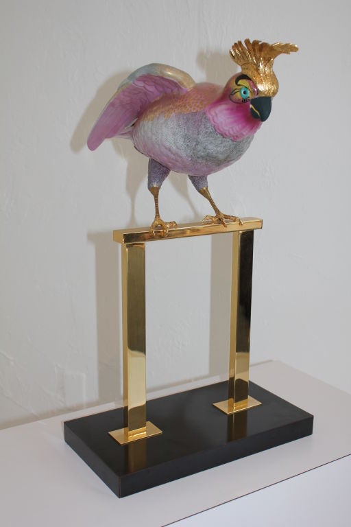 Beautiful Mangani porcelain Cockatoo on gold perch for Oggetti. The bird measures 18 3/4