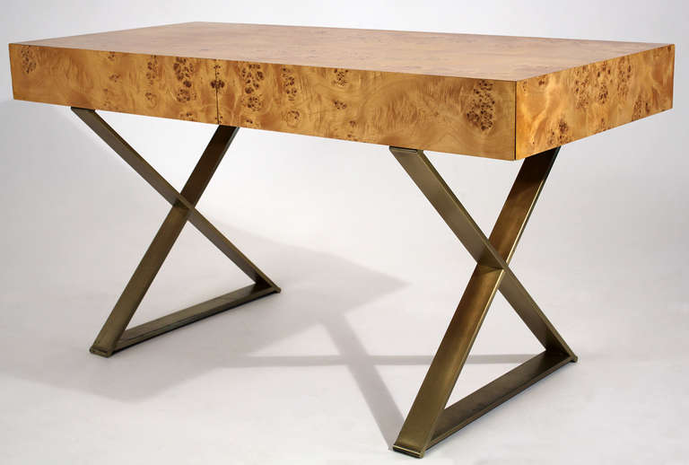 Burl wood with brushed brass finished x-base legs. This versatile piece can be used as a desk, entry table or console table.'

Excellent condition with minor wear to bottom of base as pictured.