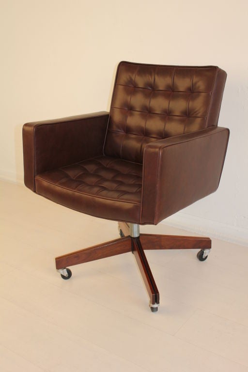 Executive office/desk chair designed by Vincent Cafiero for Knoll. Reupholstered in brown Italian leather. Base is black walnut.