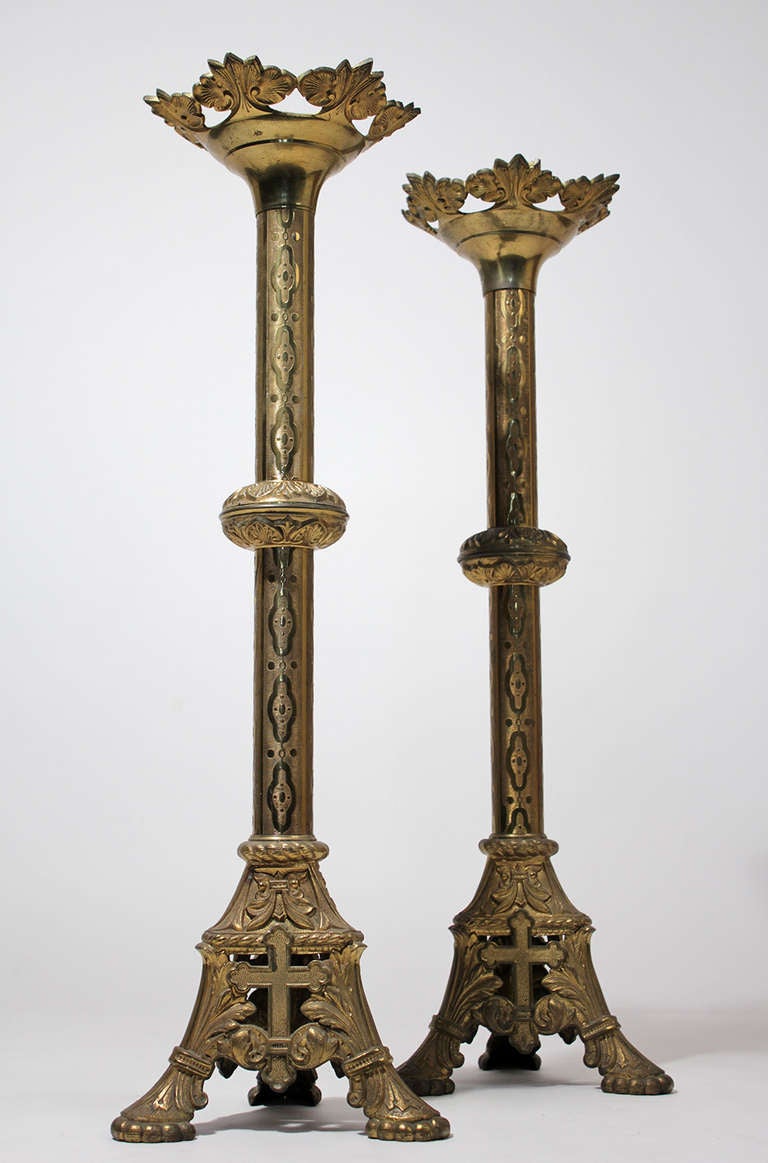 A beautiful and ornate pair of vintage cast brass Catholic Church gothic style altar candlesticks. Floor standing at 30