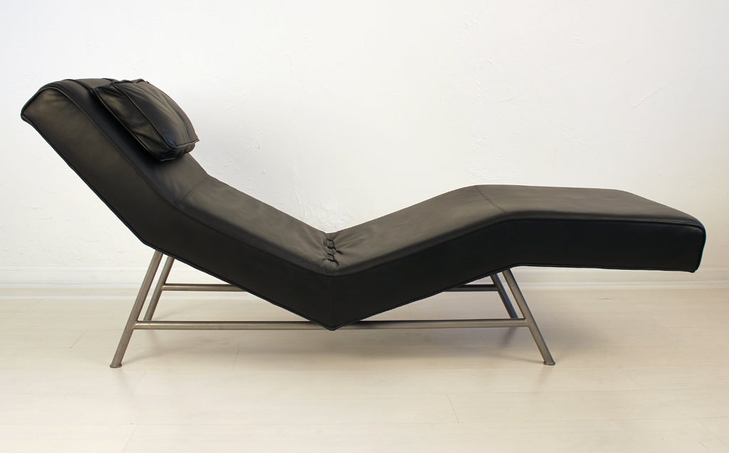 Milo Baughman #820-400 chaise lounge in black leather. Baughman designed this for Thayer Coggin in 1954. It was then re-issued in 1998. This is a reissue from 1998 which is no longer made. The chaise is in excellent condition. The leather has some