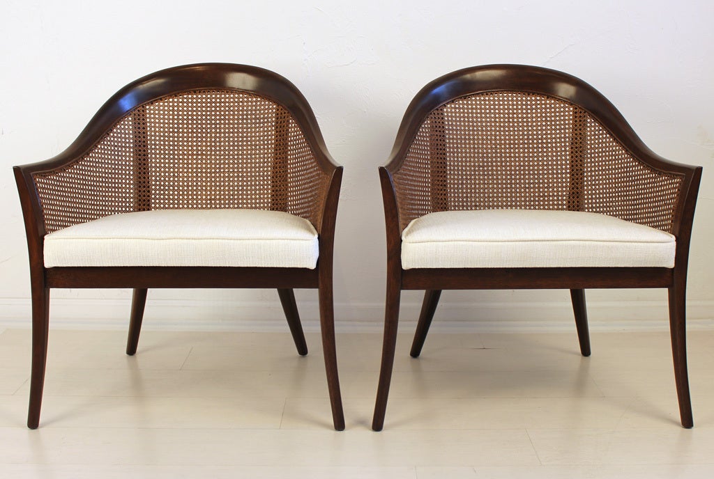 Stunning and elegant cane back lounge chairs designed by Harvey Probber.