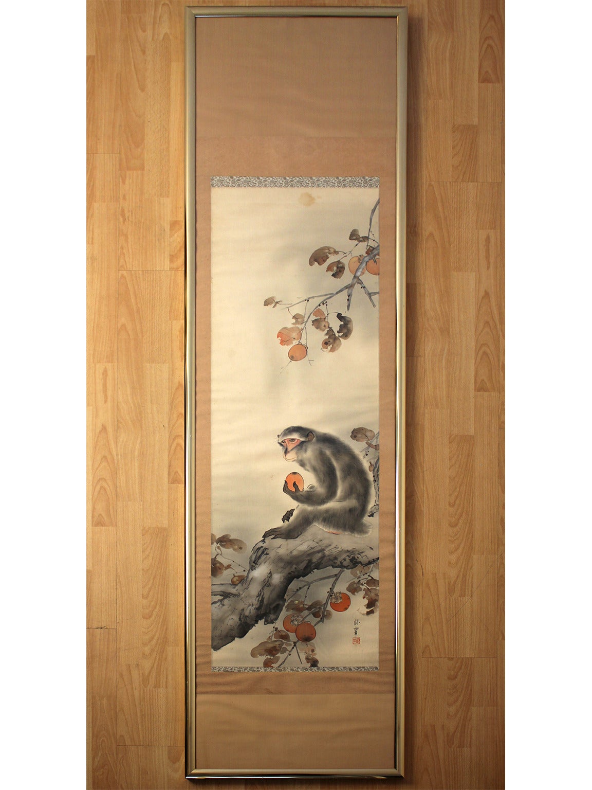 Antique Japanese Meiji period monkey with persimmon framed silk scroll painting. Signed with age related wear as pictured. Additional images on request.

Measures: 76