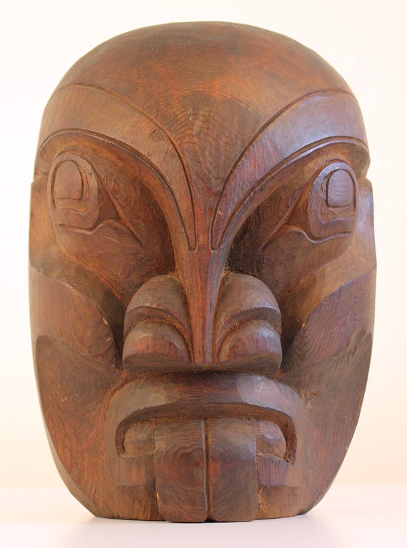 Deep carved Northwest Coast cedar mask by Henry Hunt of the Kwaka'wakw people of British Columbia. It is titled 