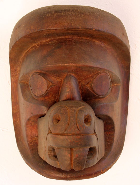 Deep carved Northwest Coast cedar mask by Chief Mungo Martin of the Kwaka'wakw people of British Columbia. It is titled 