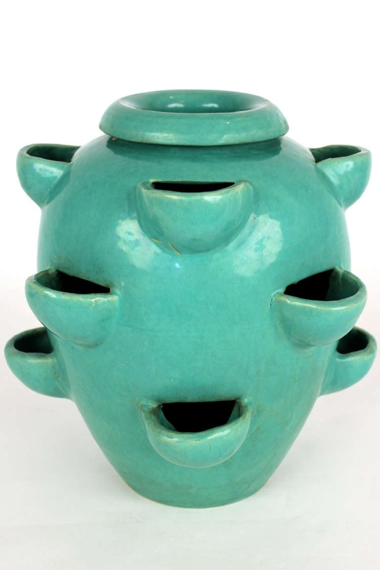 Rare version of the classic oil jar form modified at the Bauer factory. Turquoise glazed 