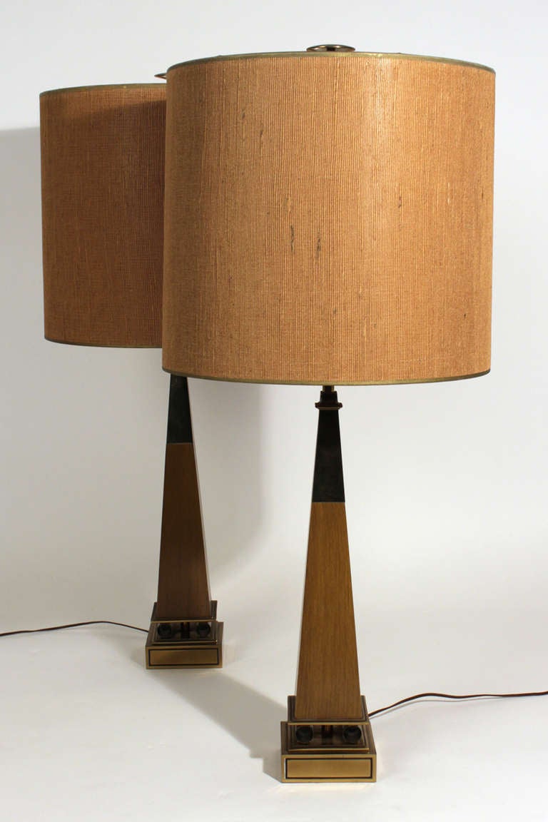 Pair of Stiffel walnut and brass finished table lamps with original shades. Both lamps and shades are marked as pictured.

Overall height: 38