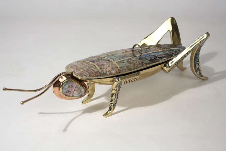 Beautifully crafted decorative polished brass lidded grasshopper dish with abalone inlay and copper head.