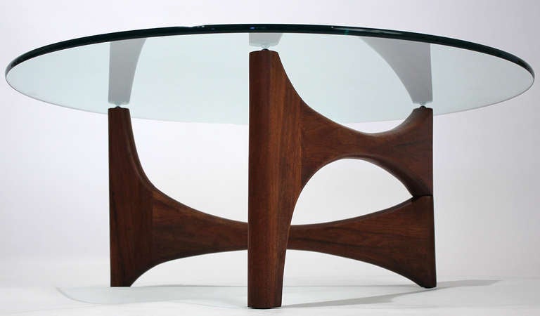 Vintage 1950s modern glass top coffee or cocktail table with solid walnut sculptural base. Both the glass top and base are in excellent condition with no issues.