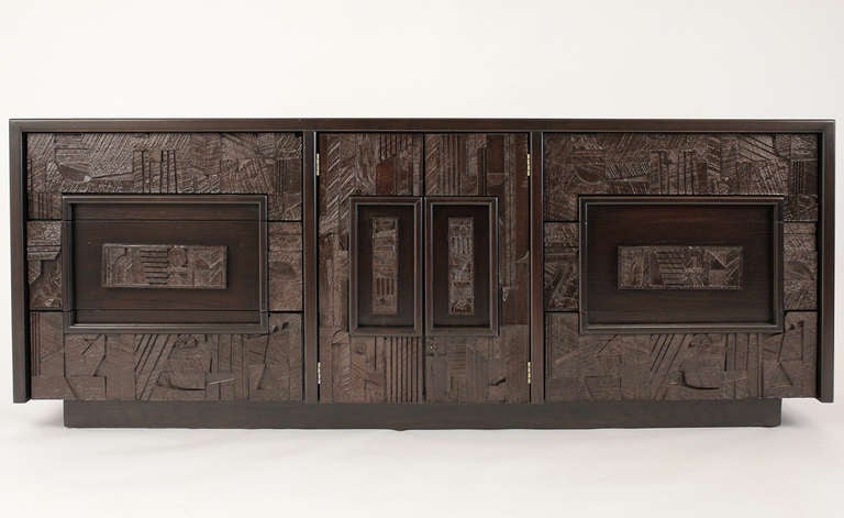 Dark brown lacquered finish on this Paul Evans style brutalist cabinet by Lane with six outer drawers and three interior drawers.