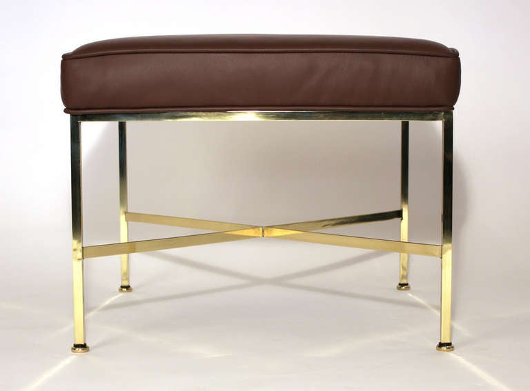 Brass X-base stool, bench or ottoman upholstered in dark brown leather designed by Paul McCobb.
