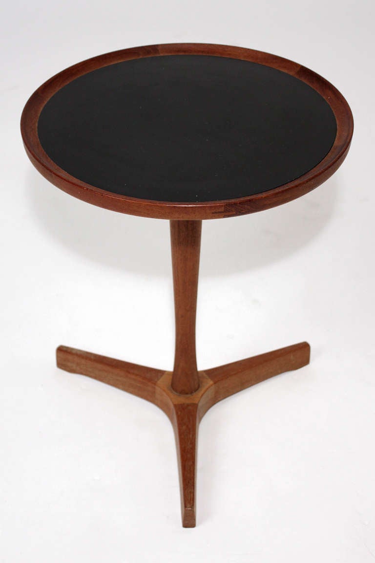 Teak tripod side table with black laminate top designed by Hans C Andersen, Denmark.