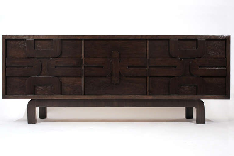 A 9-drawer dresser/cabinet with a Paul Evans/Edmund Spence inspired sculptural front in dark brown lacquered finish by Lane Furniture, USA.