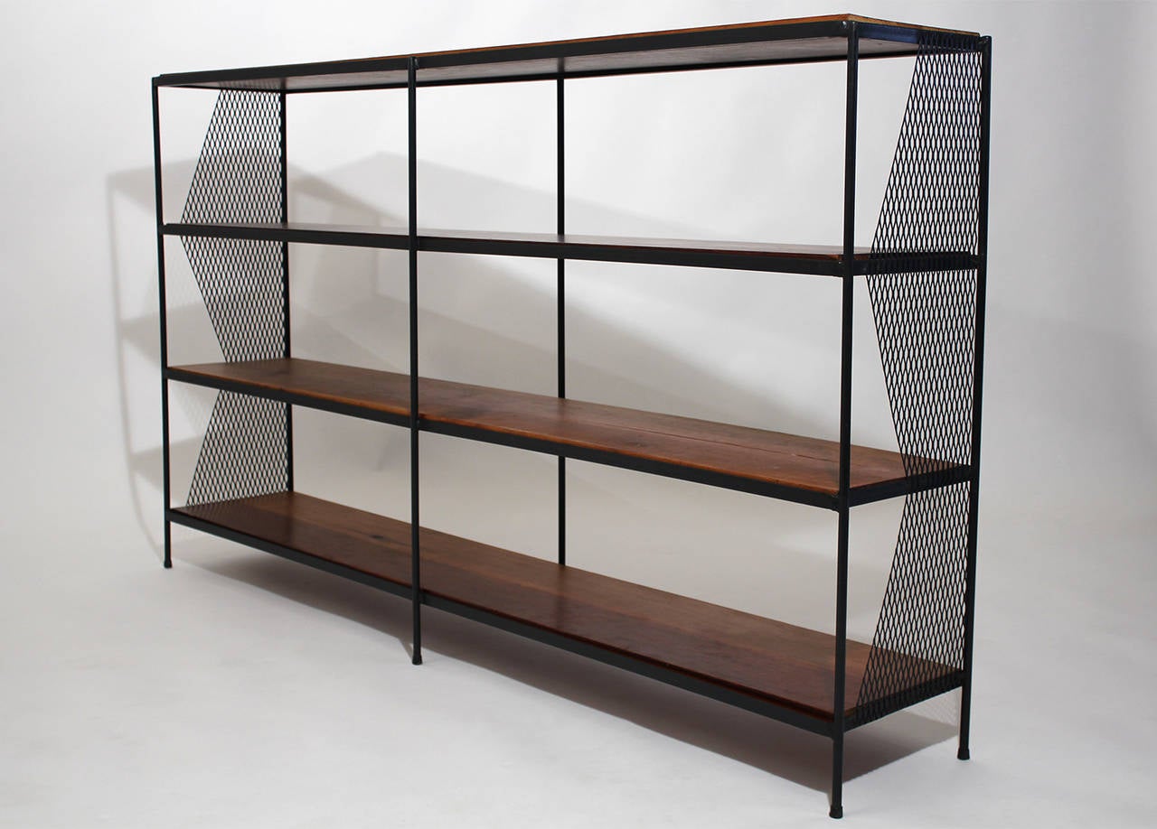 Classic California design shelf unit. Black iron framing with an expanded metal decorative treatment on the sides and solid redwood planks. All-original vintage condition. Redwood has a wonderful aged patina with minimal age appropriate wear.