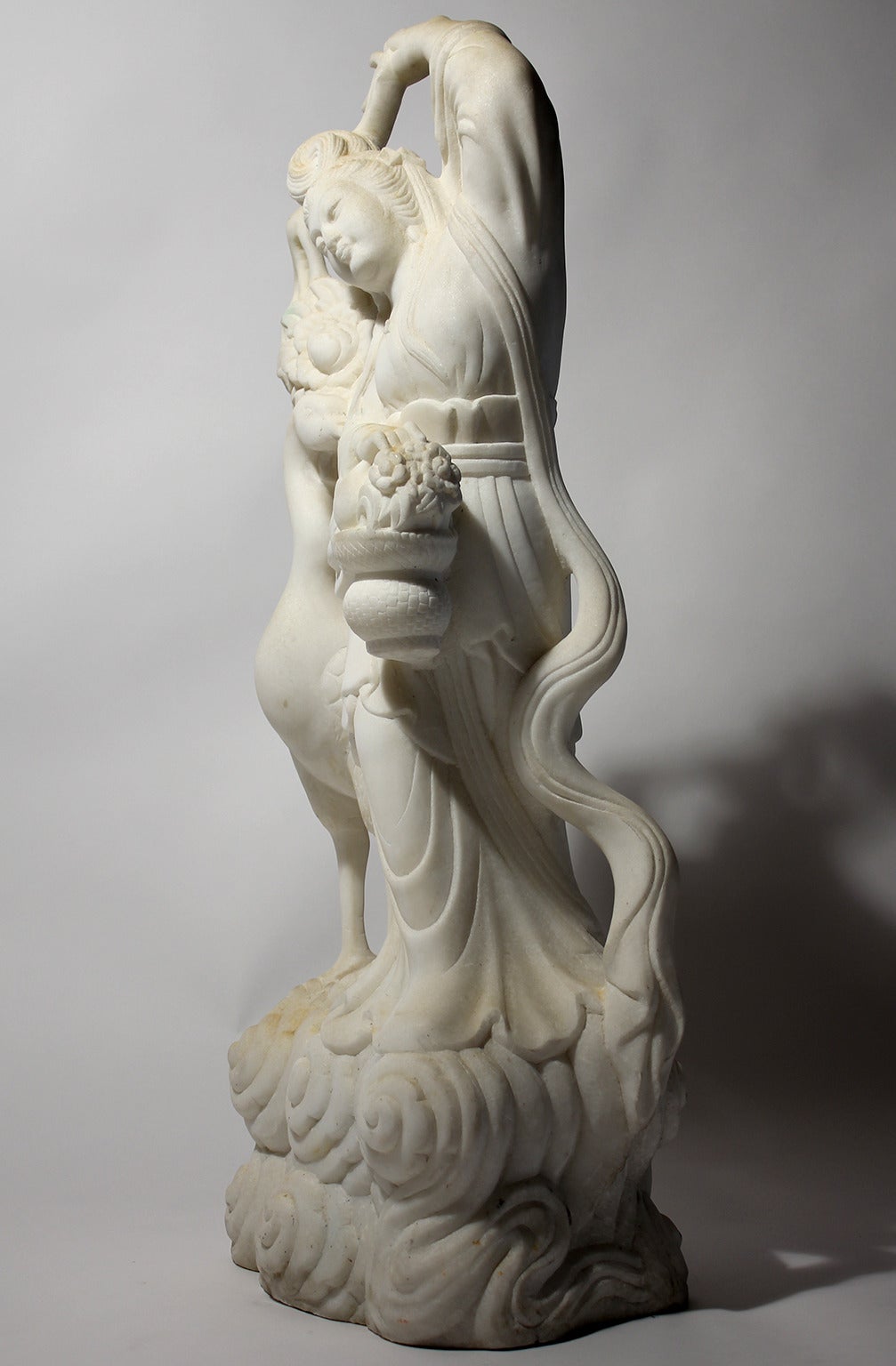 Hand-carved Chinese marble Quan Yin with crane. This sculpture has great detail and patina. Very heavy and in excellent condition.