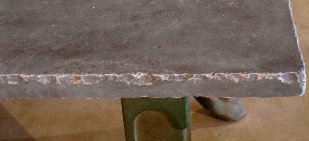 Iron Table with Carved Foot and Bluestone Plateau