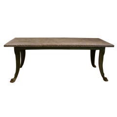 Vintage Iron Table with Carved Foot and Bluestone Plateau at 1stDibs
