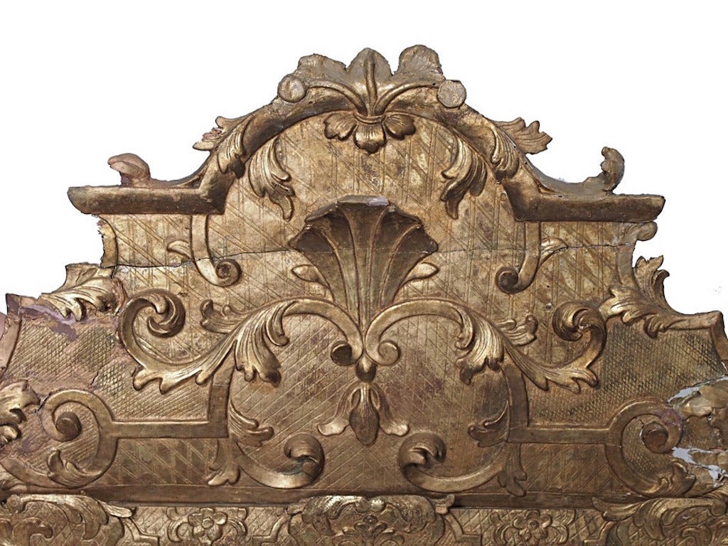 Gorgeous Regence mirror, heavily carved and gilded.