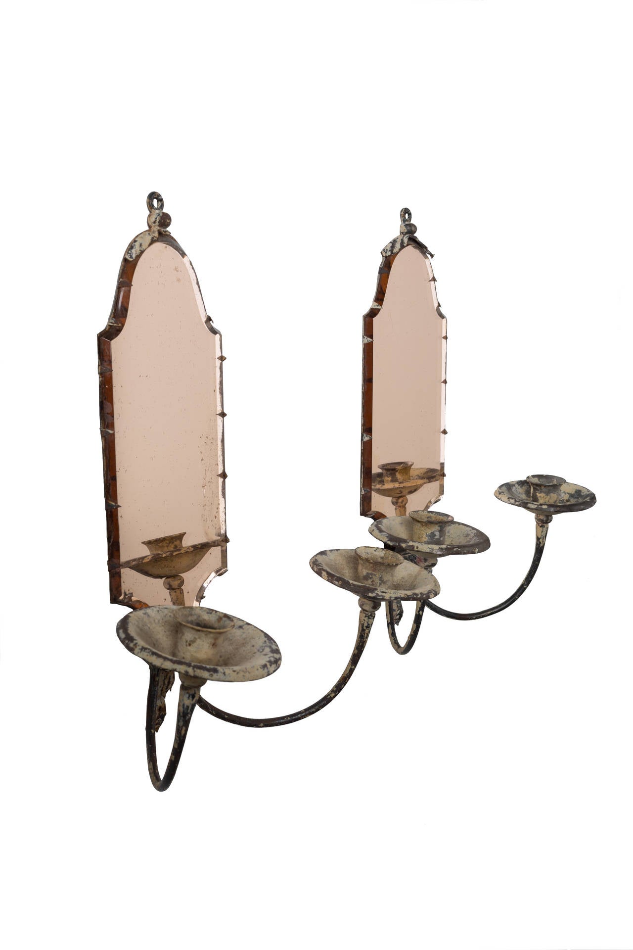 19th century pair of sconces with rose gold color mirror and antique white patina metal. Wonderful romantic addition to you walls in a ladies boudoir, dressing or powder room. Could also look lovely in a nursery or young girls bedroom. Beautiful