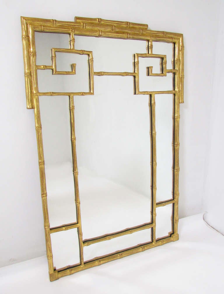 Carved and gilded faux bamboo mirror in the Chinese Chippendale manner, circa 1960s.