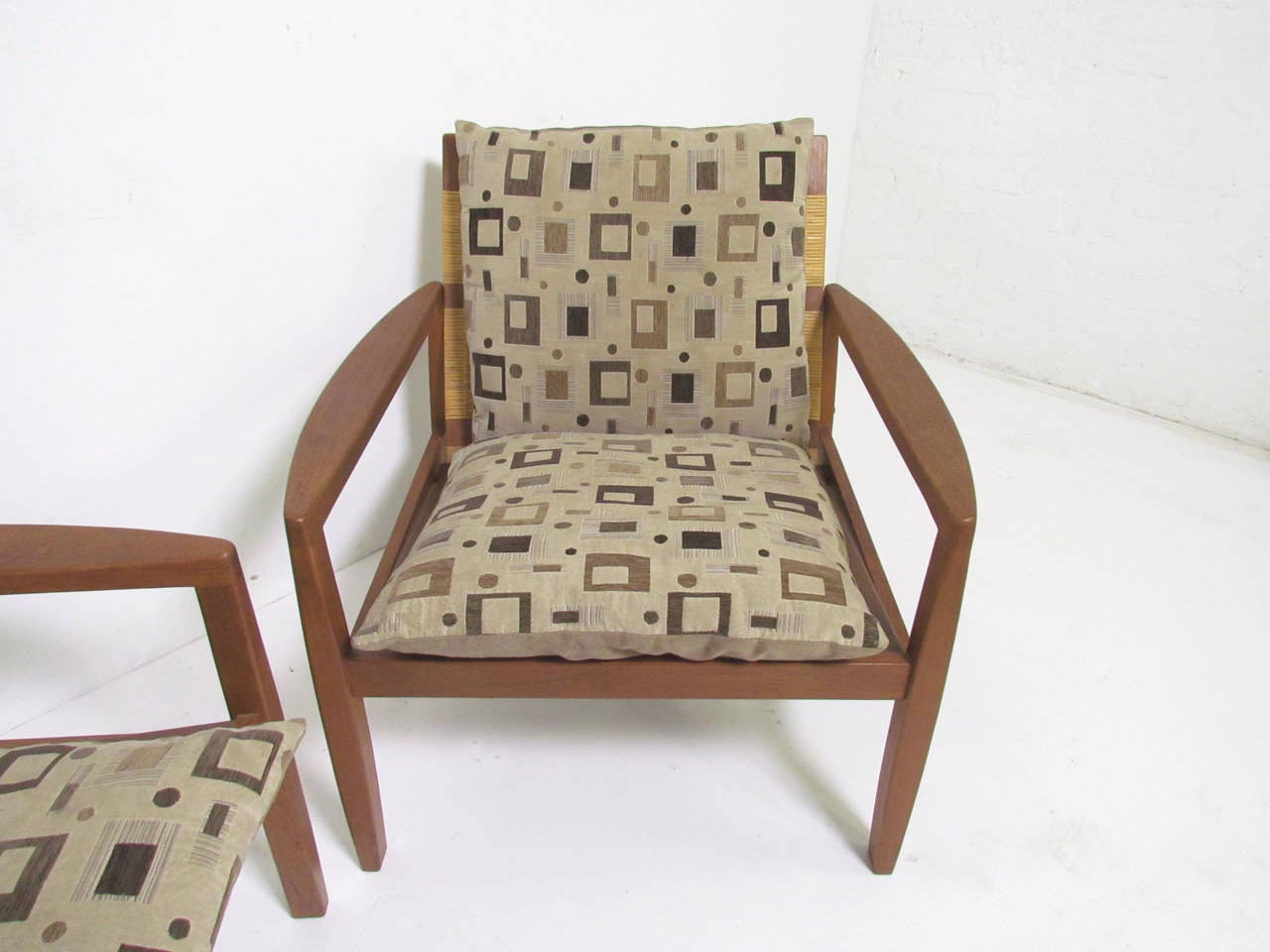 Scandinavian Modern Pair of Danish Teak and Cane Lounge Chairs by Hans Olsen