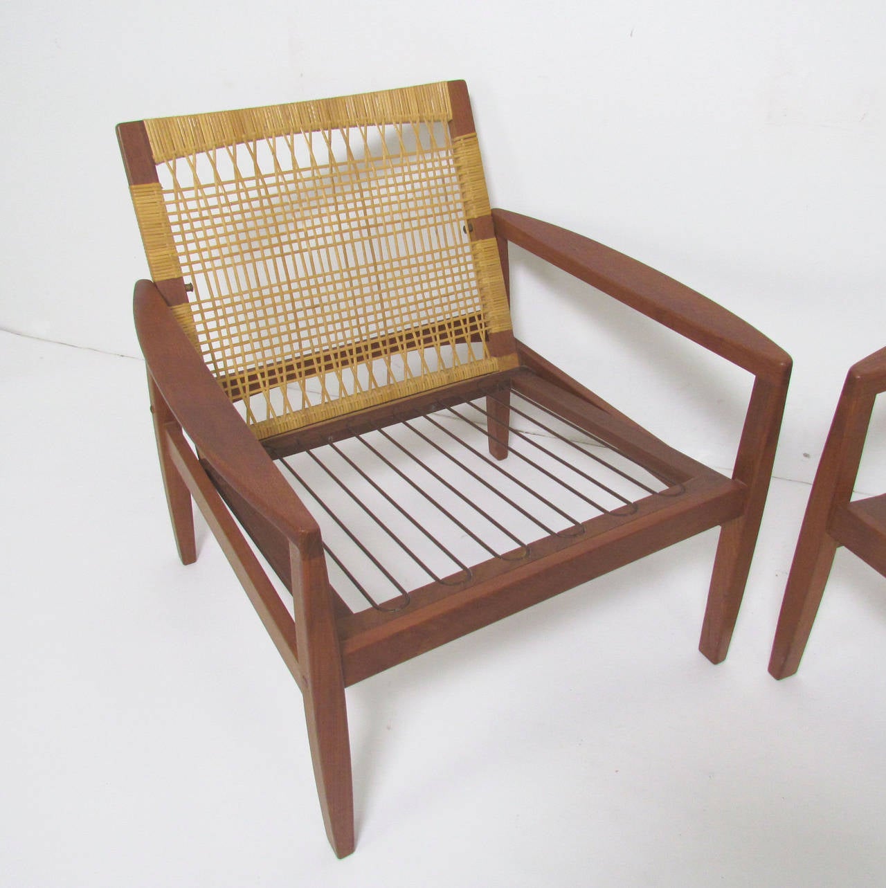 Mid-20th Century Pair of Danish Teak and Cane Lounge Chairs by Hans Olsen