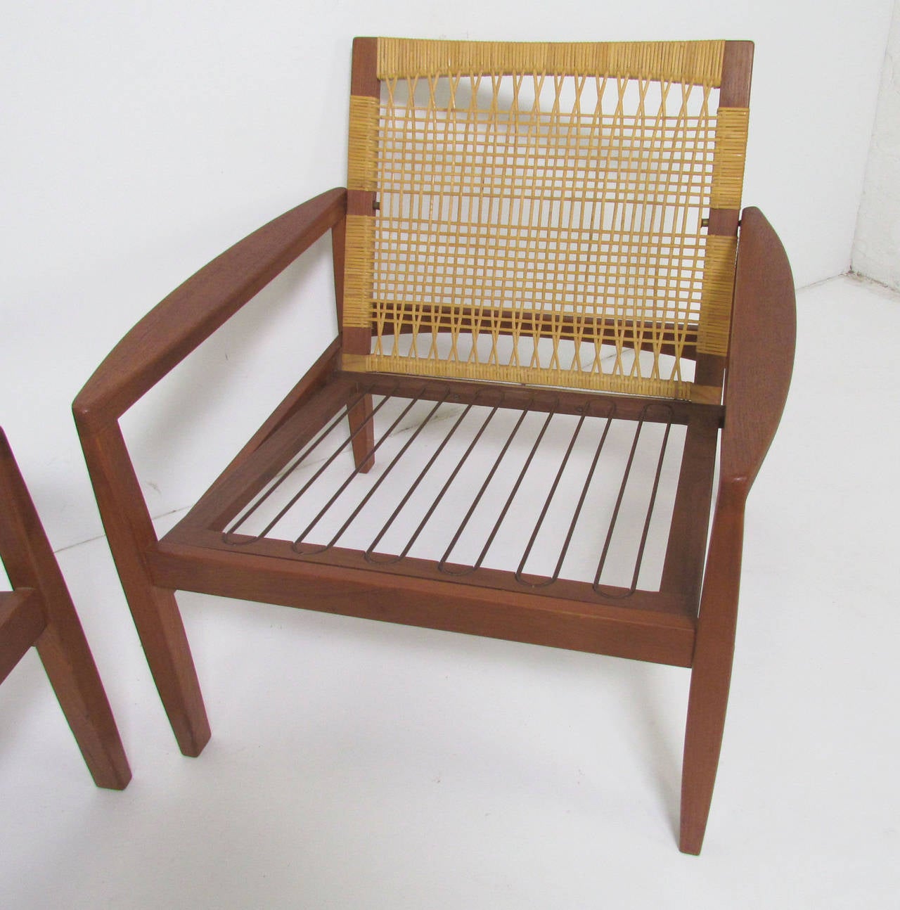 Pair of Danish Teak and Cane Lounge Chairs by Hans Olsen 1