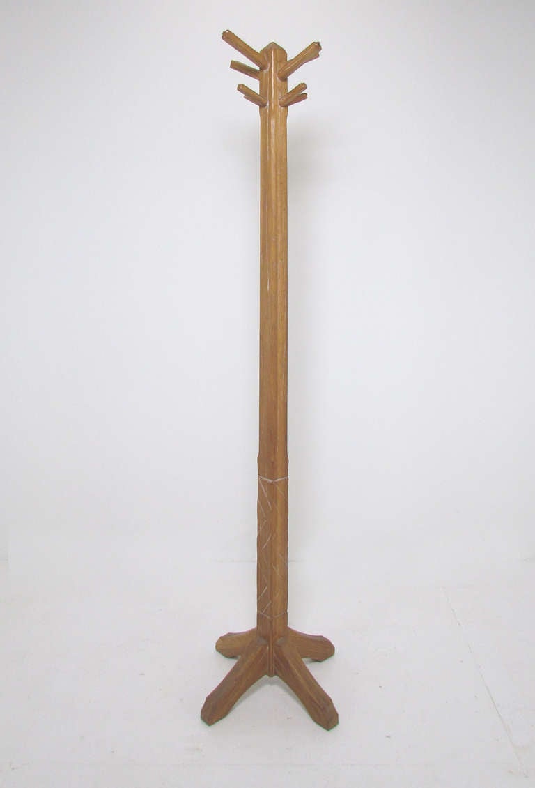 Stately carved and lightly cerused oak coat stand or hall tree in the Western vernacular by A. Brandt for their popular Ranch Oak line of furniture.
