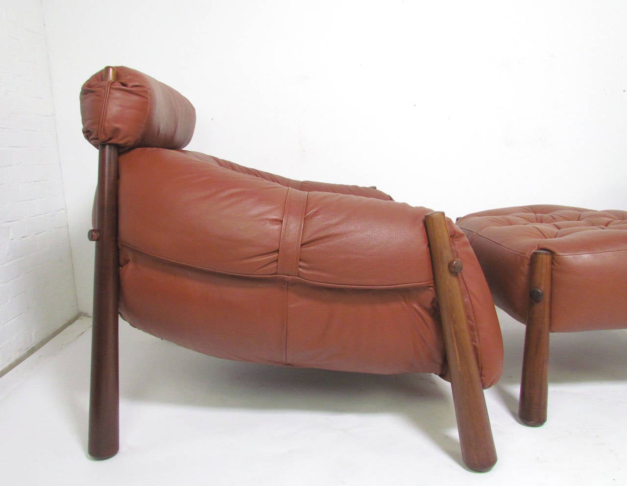 Pair of lounge chairs in leather designed by Percival Lafer for Lafer S.A. Industries, Brazil, circa 1958. Reverse tapered splayed legs in jacaranda (Brazilian rosewood). 

A virtual time capsule in terms of condition, these pieces were kept